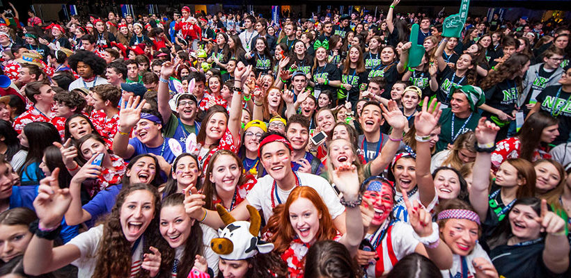 Group of people celebrating on stage