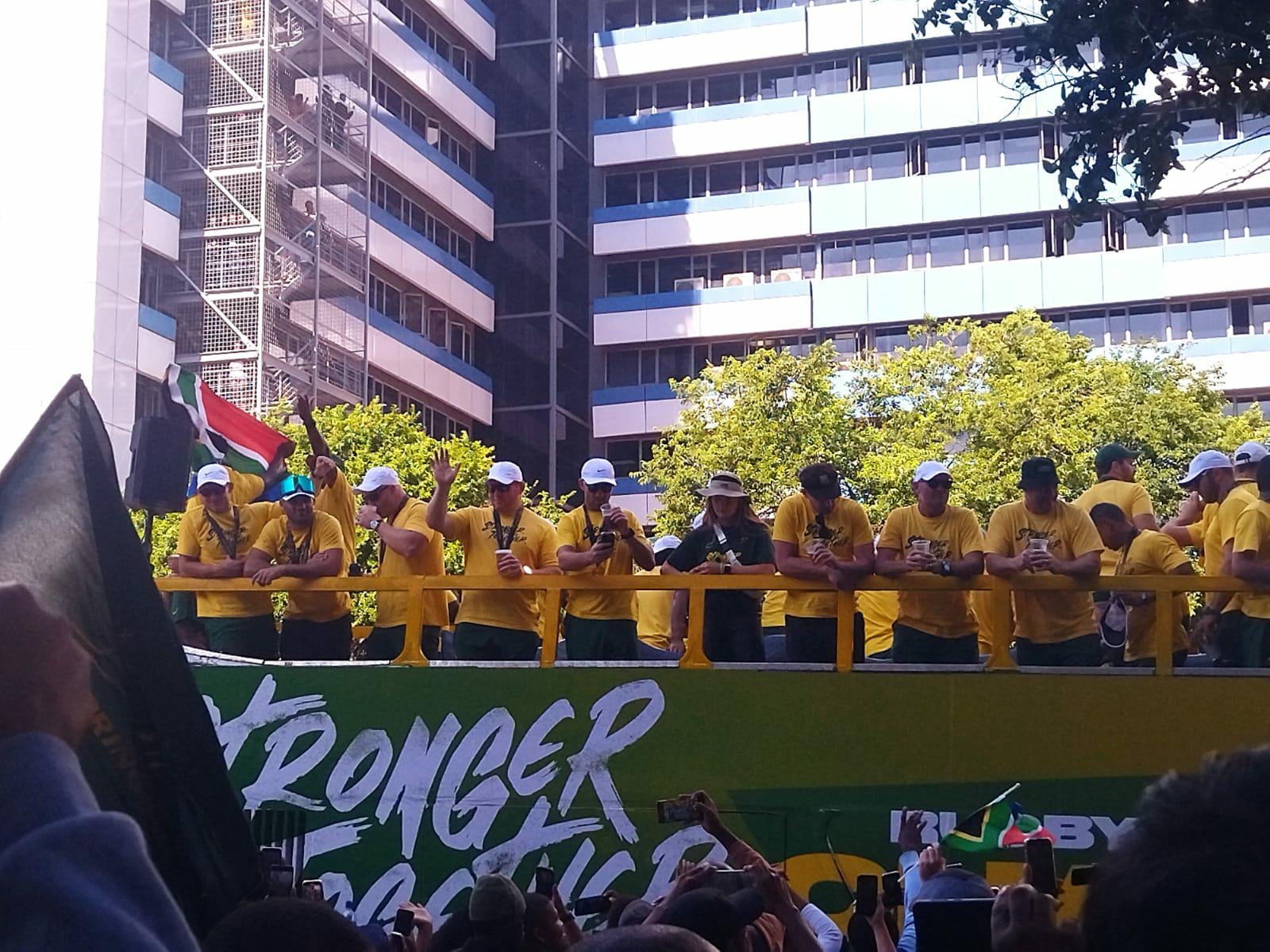 Group of people celebrating on stage