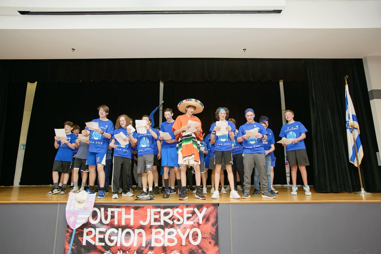 Group of people celebrating on stage