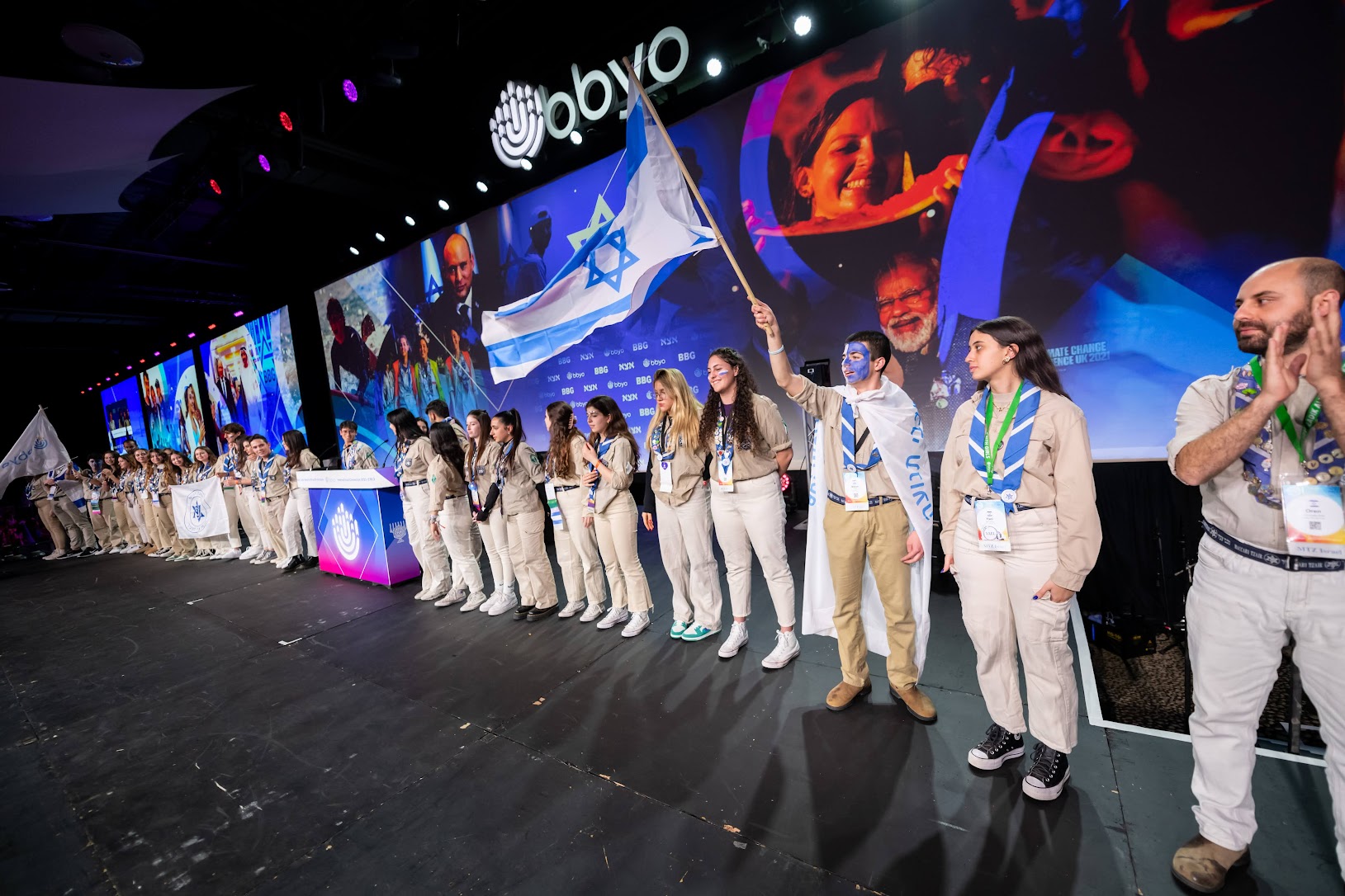 Group of people celebrating on stage
