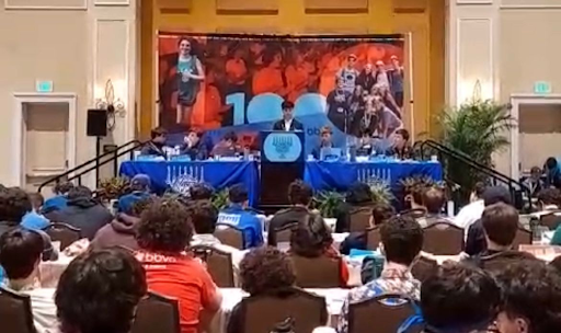 Group of people celebrating on stage