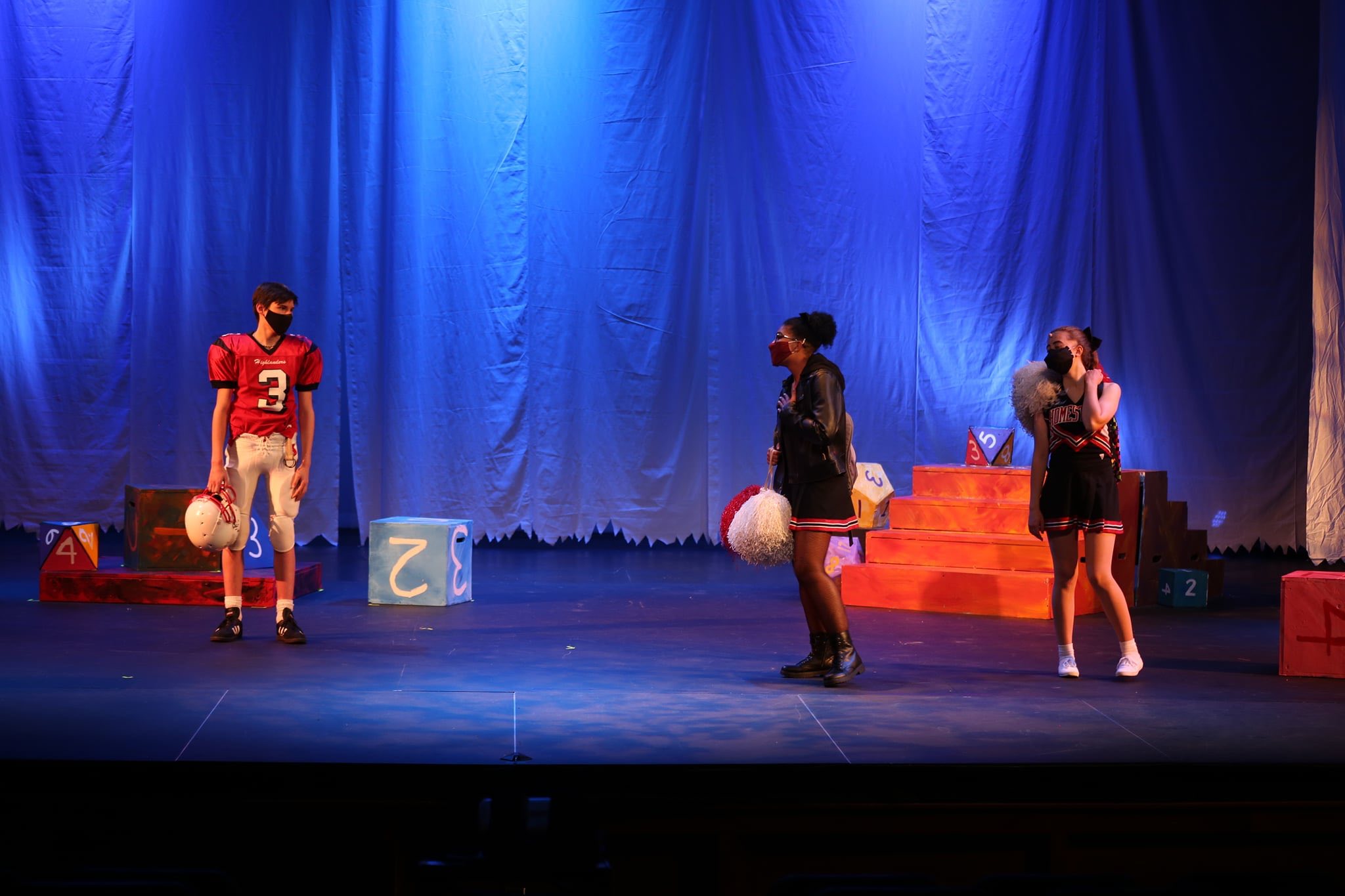 Group of people celebrating on stage