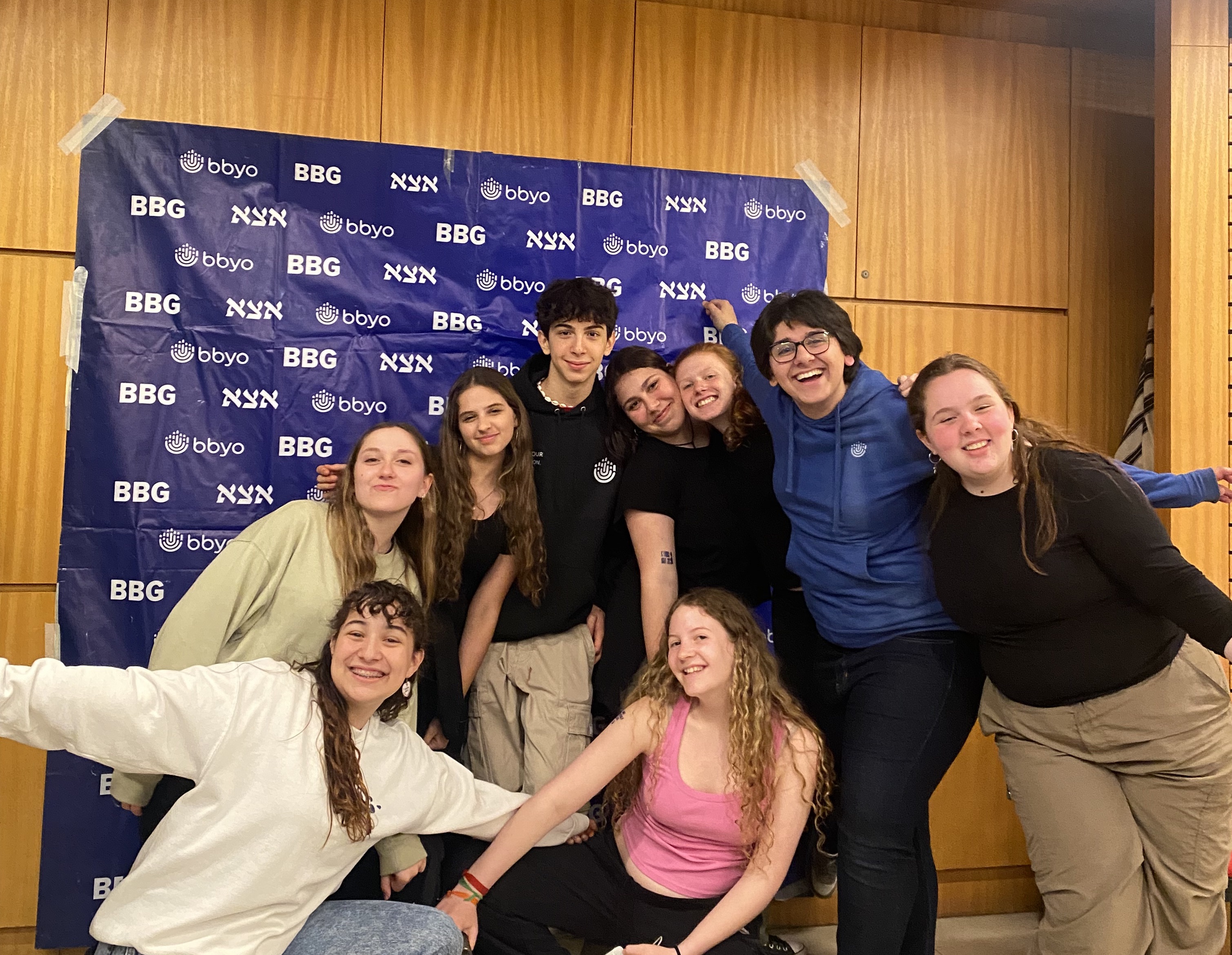 Group of people celebrating on stage