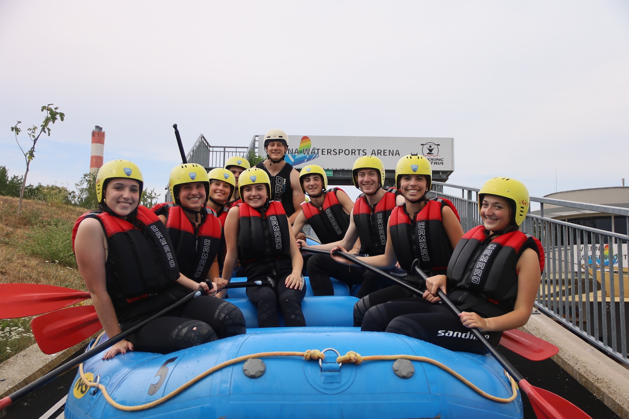 Group of people smiling outdoors