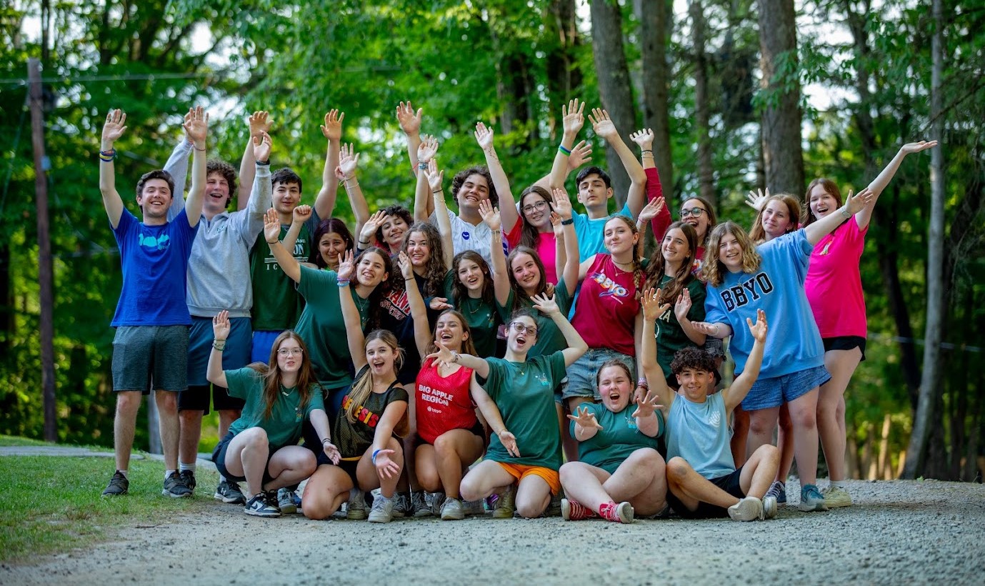 Group of people smiling outdoors