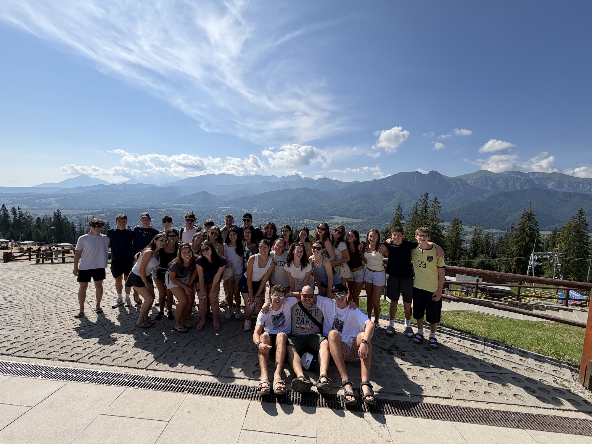 Group of people smiling outdoors