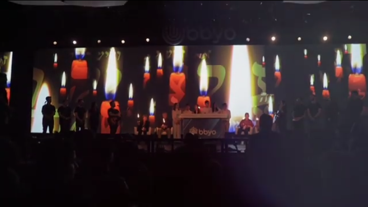Group of people celebrating on stage