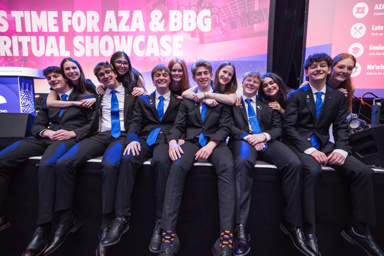 Group of people celebrating on stage